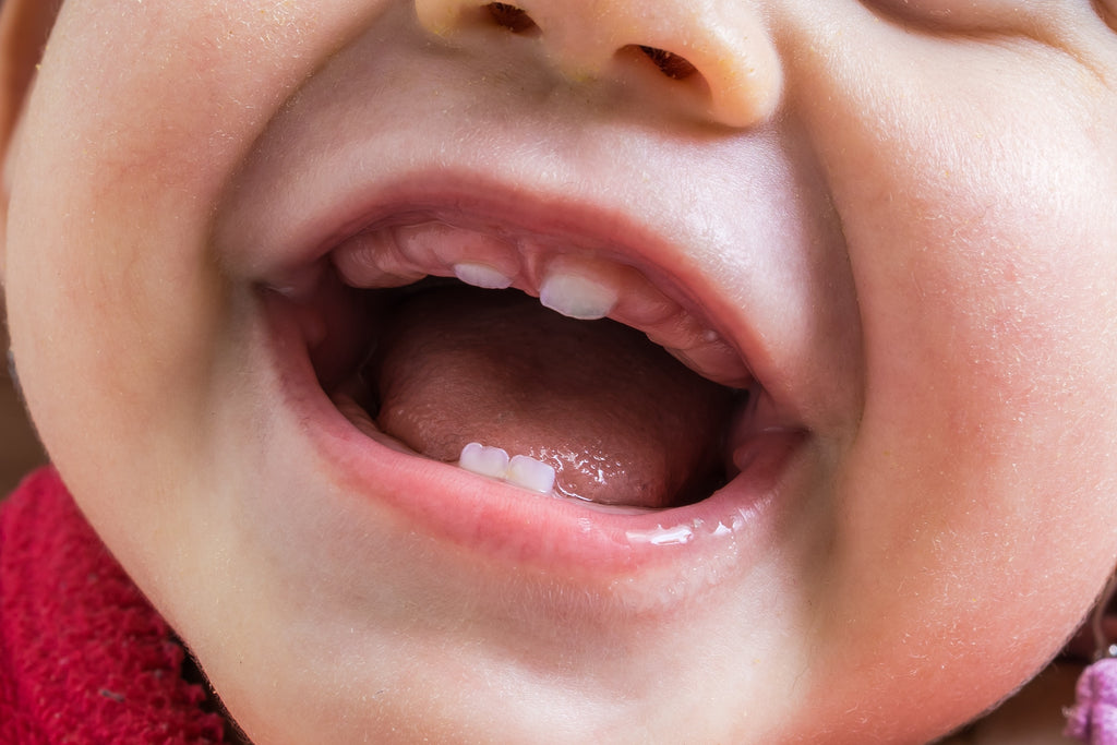 6 Signs Babies Get Their First Tooth